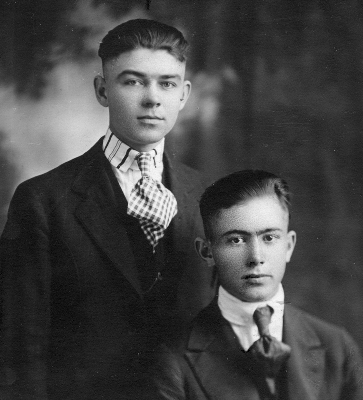 Carpenter, Kenneth (Standing,left) with unknown friend or family member